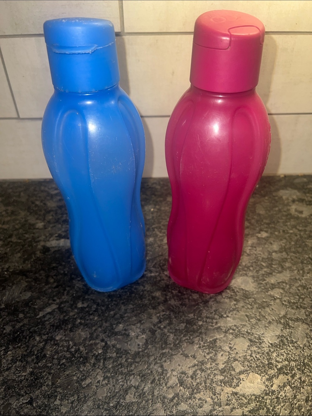 Pair of Tupperware Eco Bottles. Reusable Plastic Water Bottles - Blue and Pink